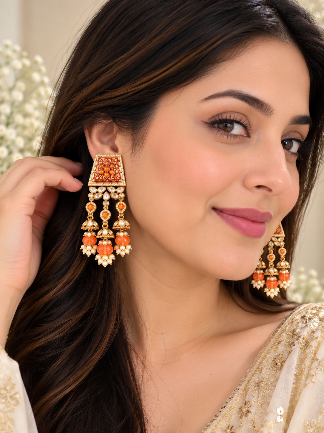 Orange meenakari kundan earrings